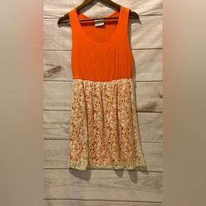 Orange dress with tan overall lace